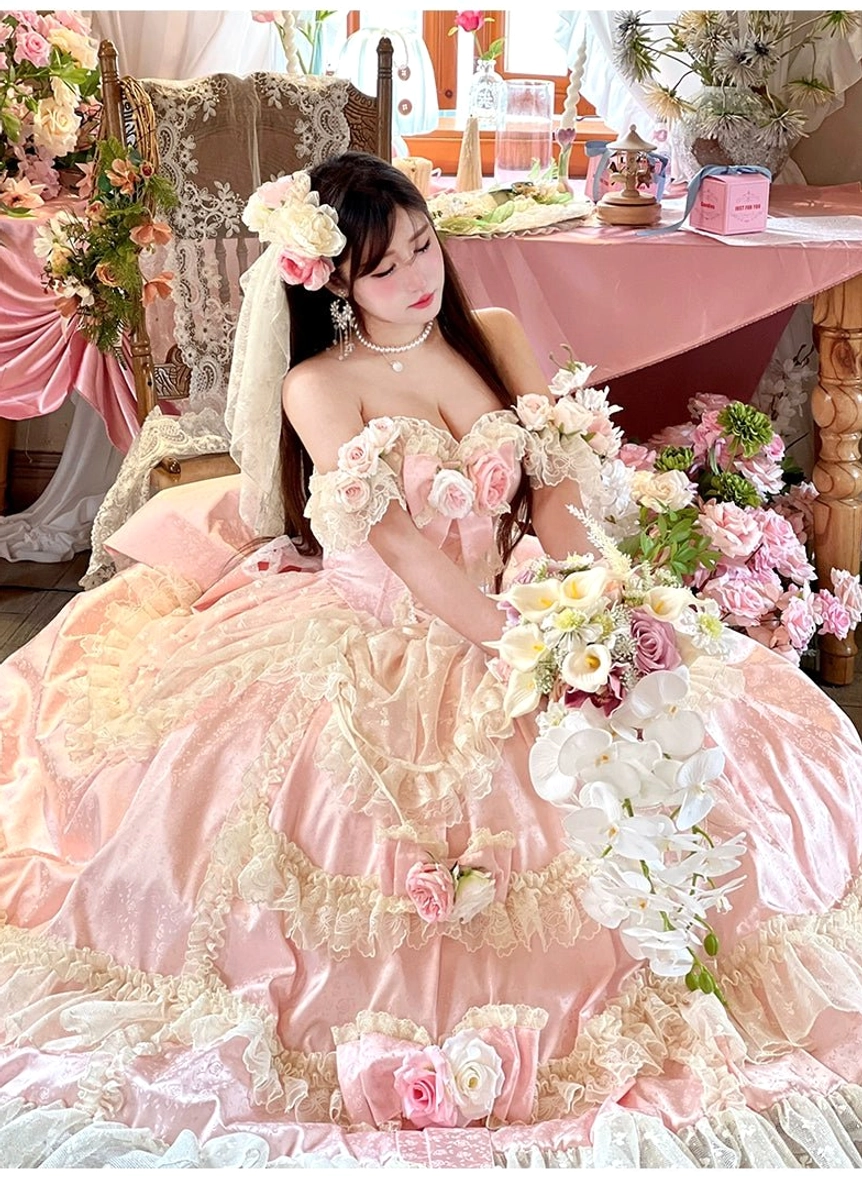 Full bodice detail of tiered ruffles and rose decorations on off-shoulder bridal lolita wedding dress