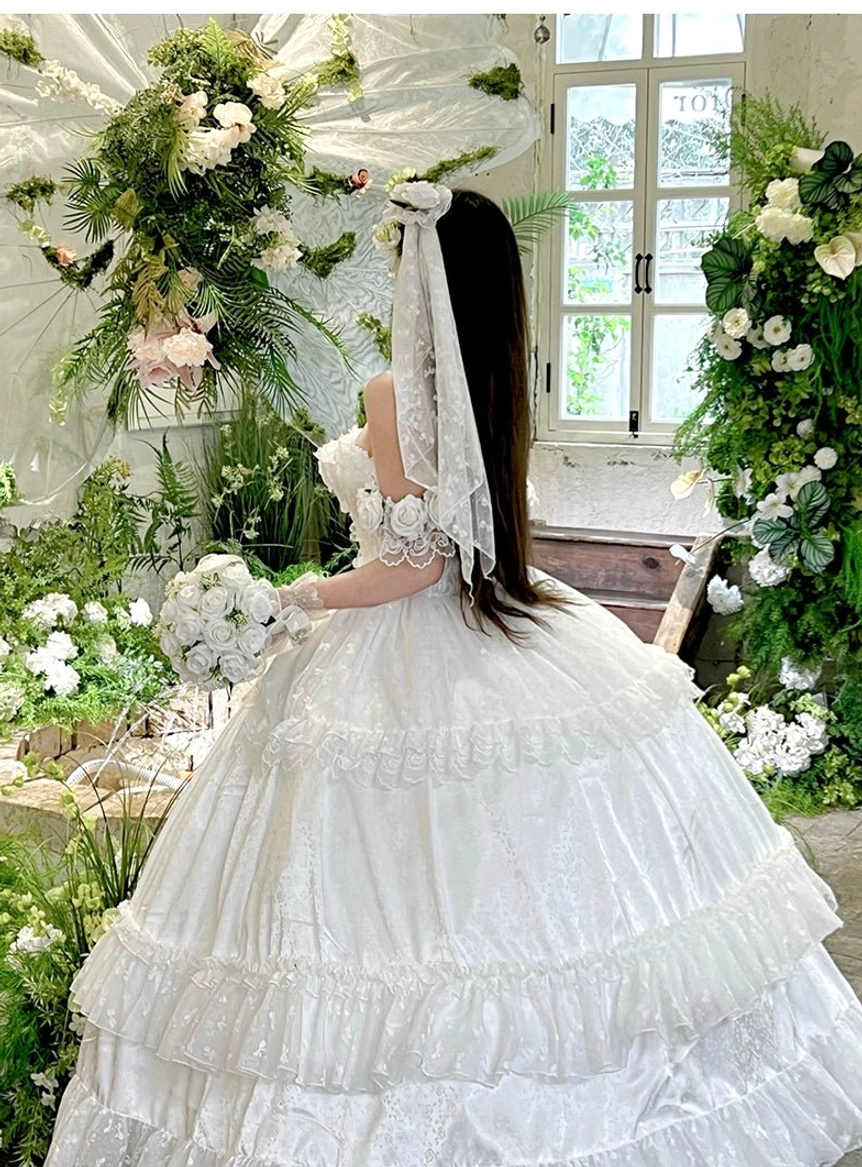 Detail shot of off-shoulder ruffled neckline and sweetheart design on princess bridal lolita wedding dress