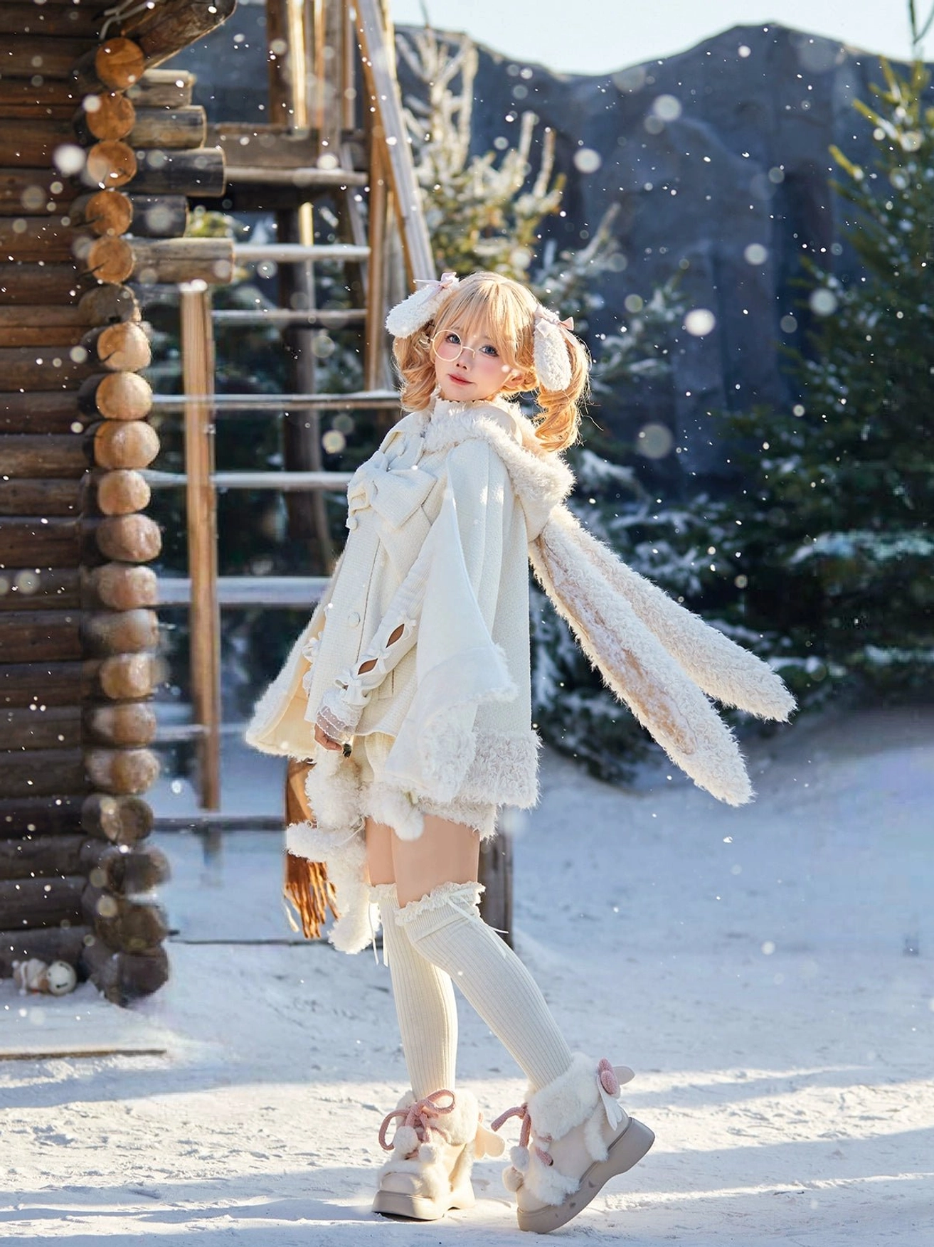 Brown bear ear hooded lolita cape with fuzzy collar construction and detachable front bow showing back view with fluffy tail accent and structured silhouette