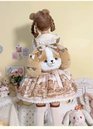 Brown Cocker Spaniel plush lolita backpack worn by model in sweet lolita bear-themed dress with twin curly buns, back view