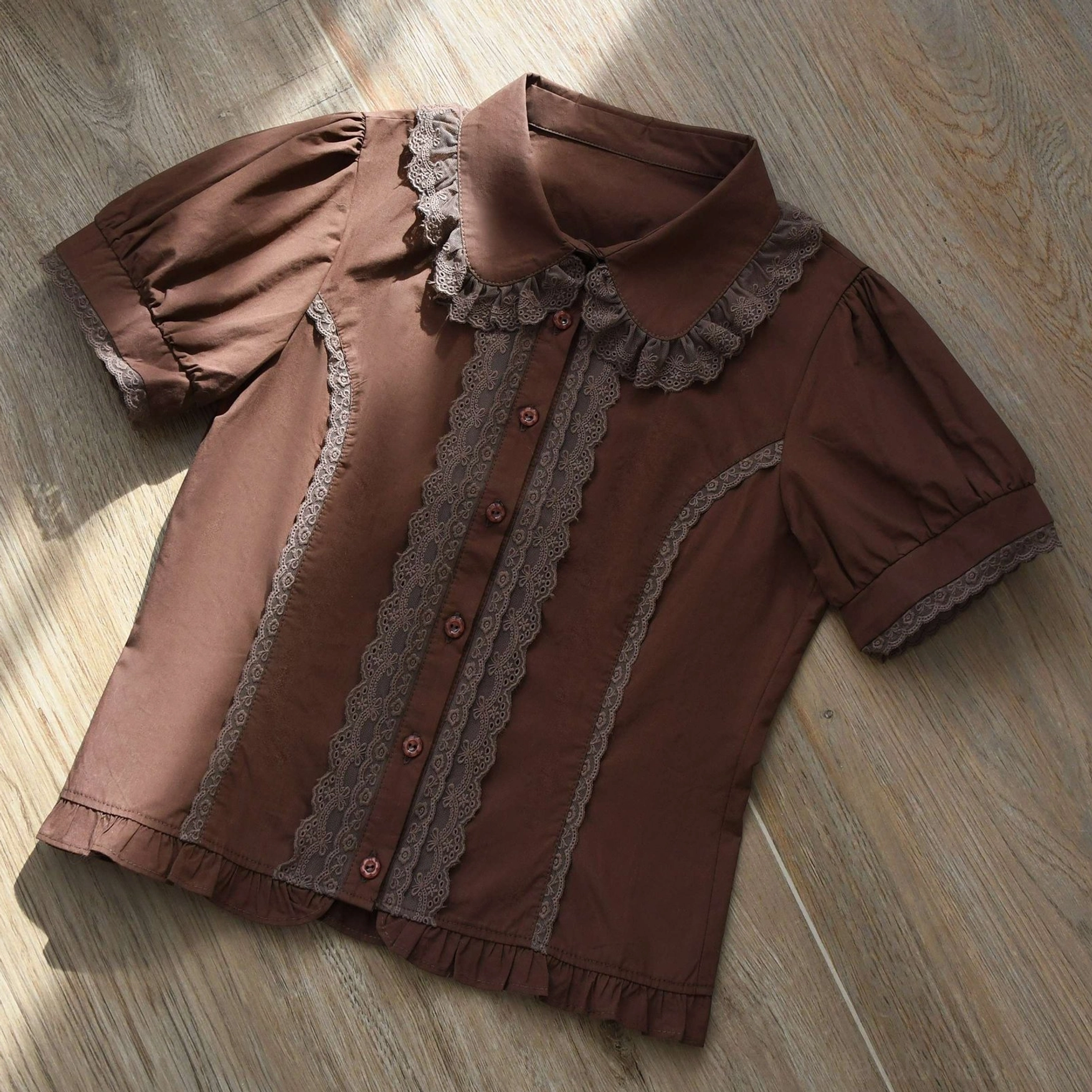 Brown vintage Lolita short-sleeve blouse with lace ruffled Peter Pan collar brown lace trim panel puff sleeves with cuffs and matching brown buttons