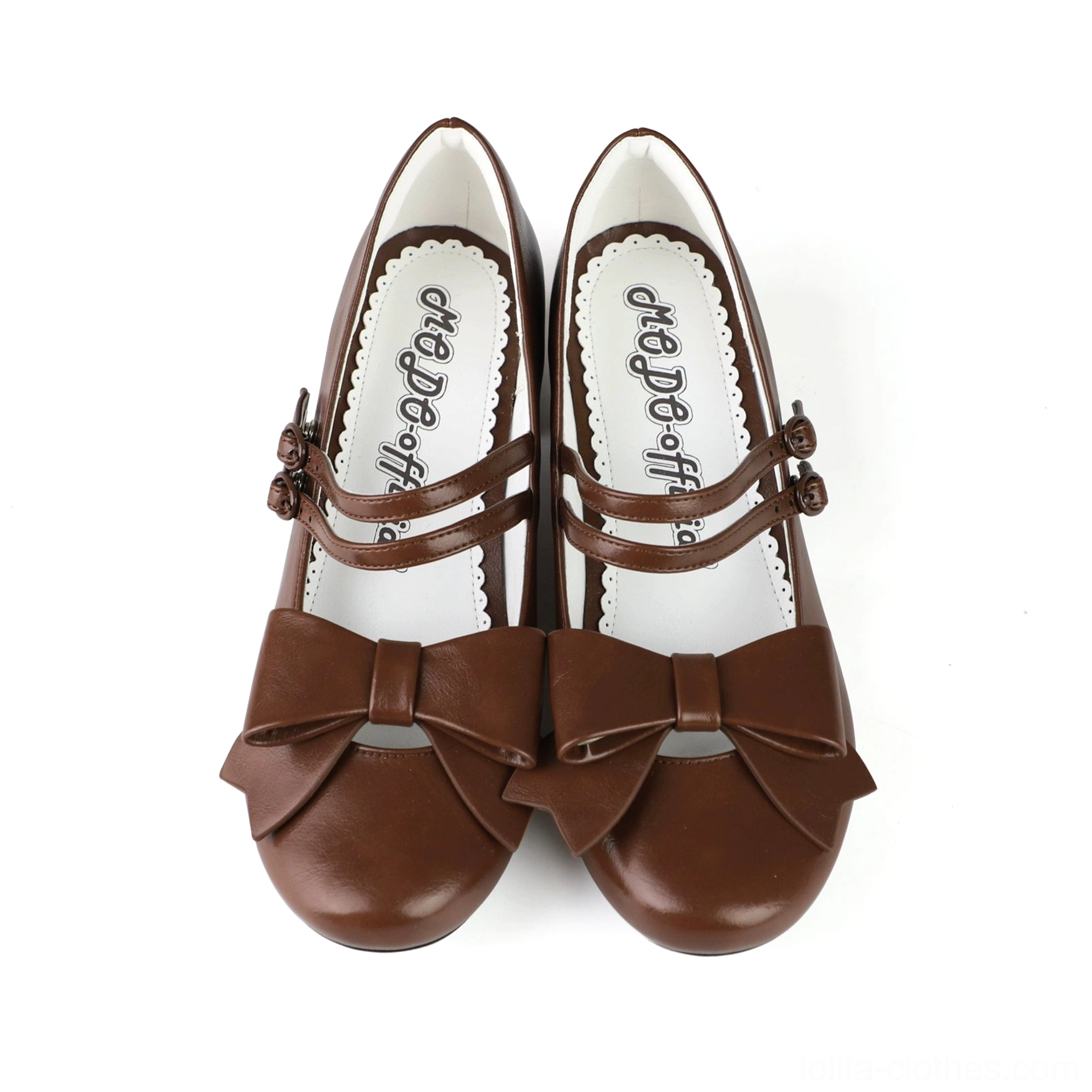Brown Lolita Mary Jane shoes detailed product shot glossy patent leather finish low block heel ankle strap bow classic Mary Jane silhouette