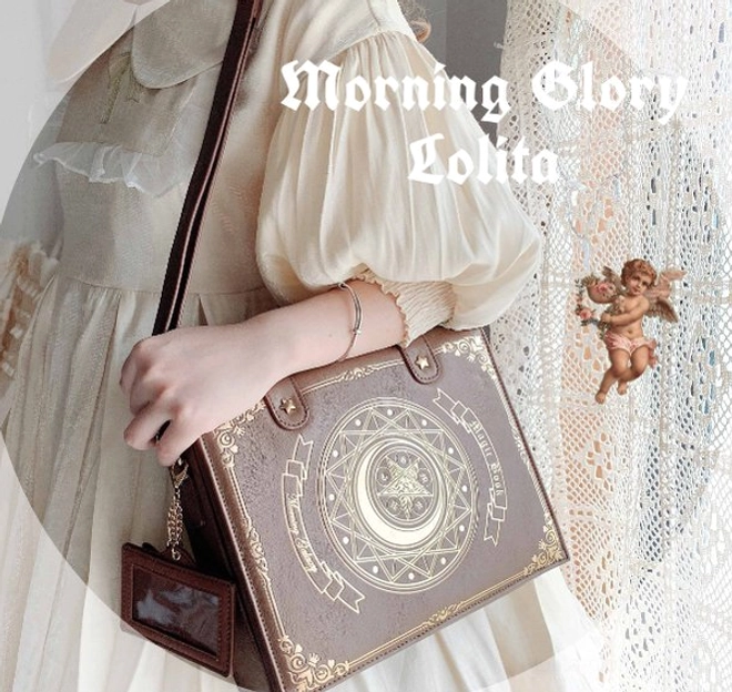 Brown book-shaped lolita crossbody bag with adjustable long shoulder strap and gold magic circle pattern on premium leather