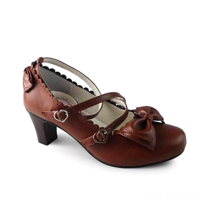 Brown matte lolita tea party heels with vintage-inspired scalloped collar, crossover heart-buckle ankle straps, front and rear bow ornaments, classic block heel