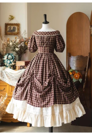 Dark brown plaid vintage lolita dress worn with ivory ruffled underskirt showing layered hem and coordinated styling on dress form
