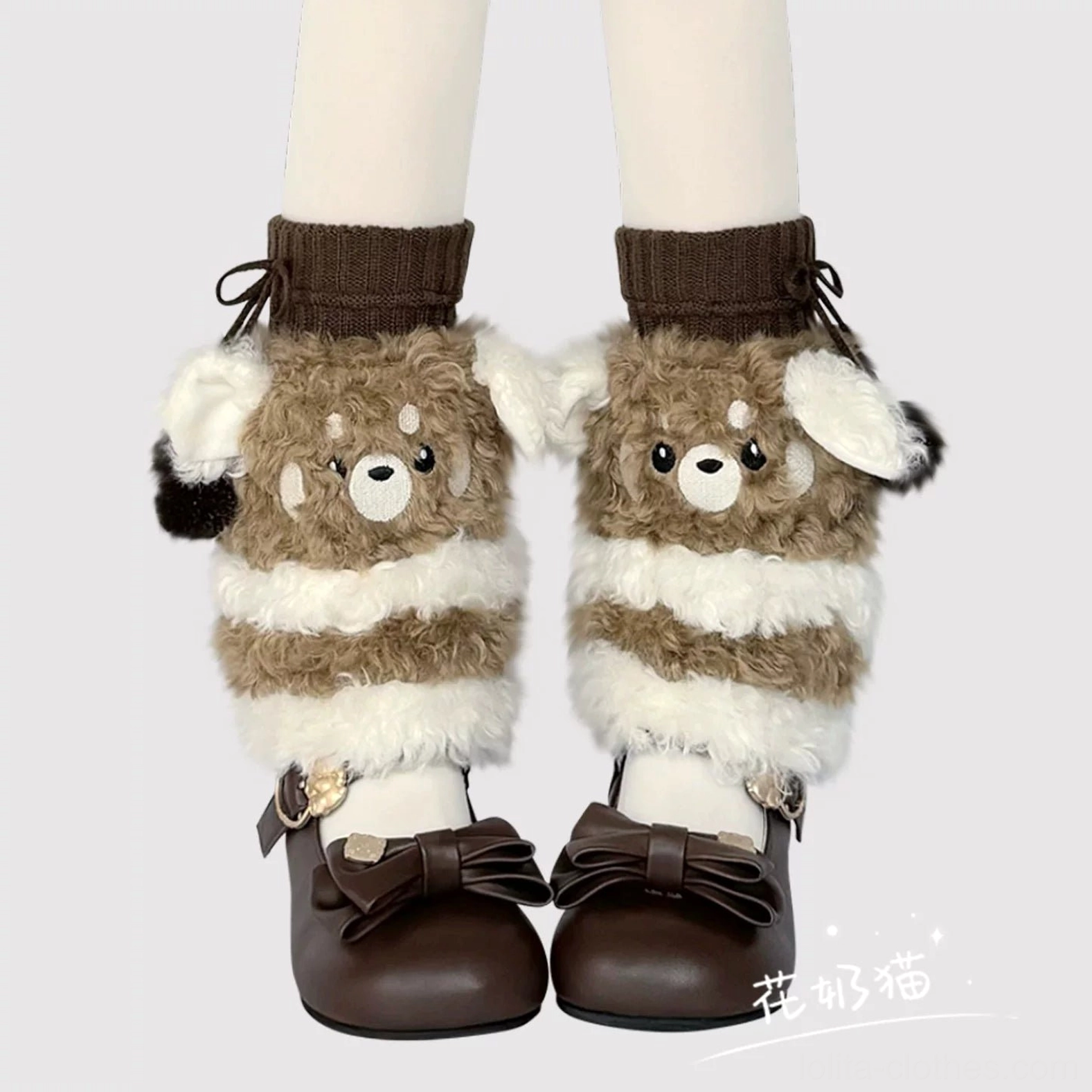 Brown-white striped plush bear leg warmers with 3D floppy ears and ribbon tied ribbed cuff direct front close-up detail view
