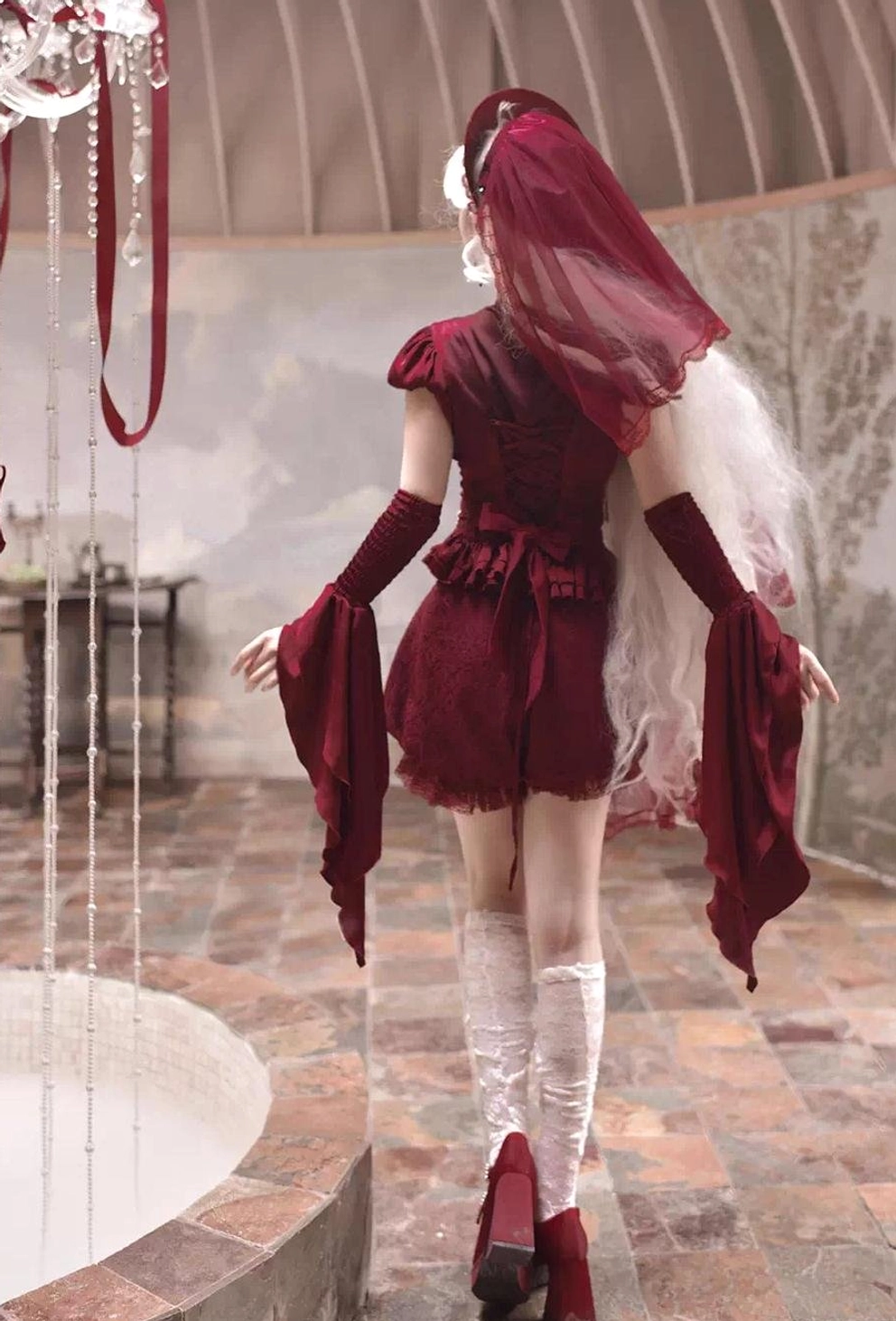 Burgundy Gothic Lolita blouse with veil back full view real model vintage tiled space red veil matching detachable arm drapes