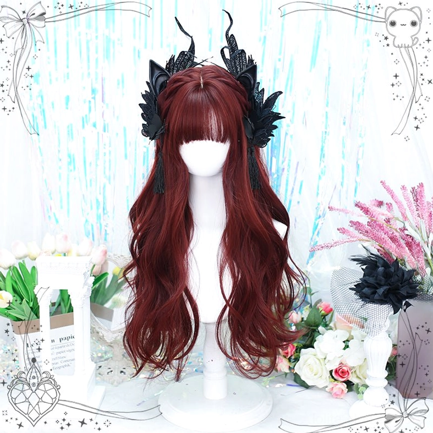 Close-up frontal view of burgundy Gothic Lolita wig showing voluminous waves and neat blunt bangs with gothic hair ornaments