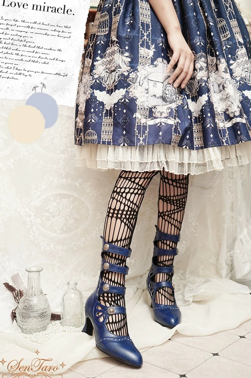 Burgundy handcrafted Lolita Mary Jane boots with four decorative straps showing full silhouette and heel profile