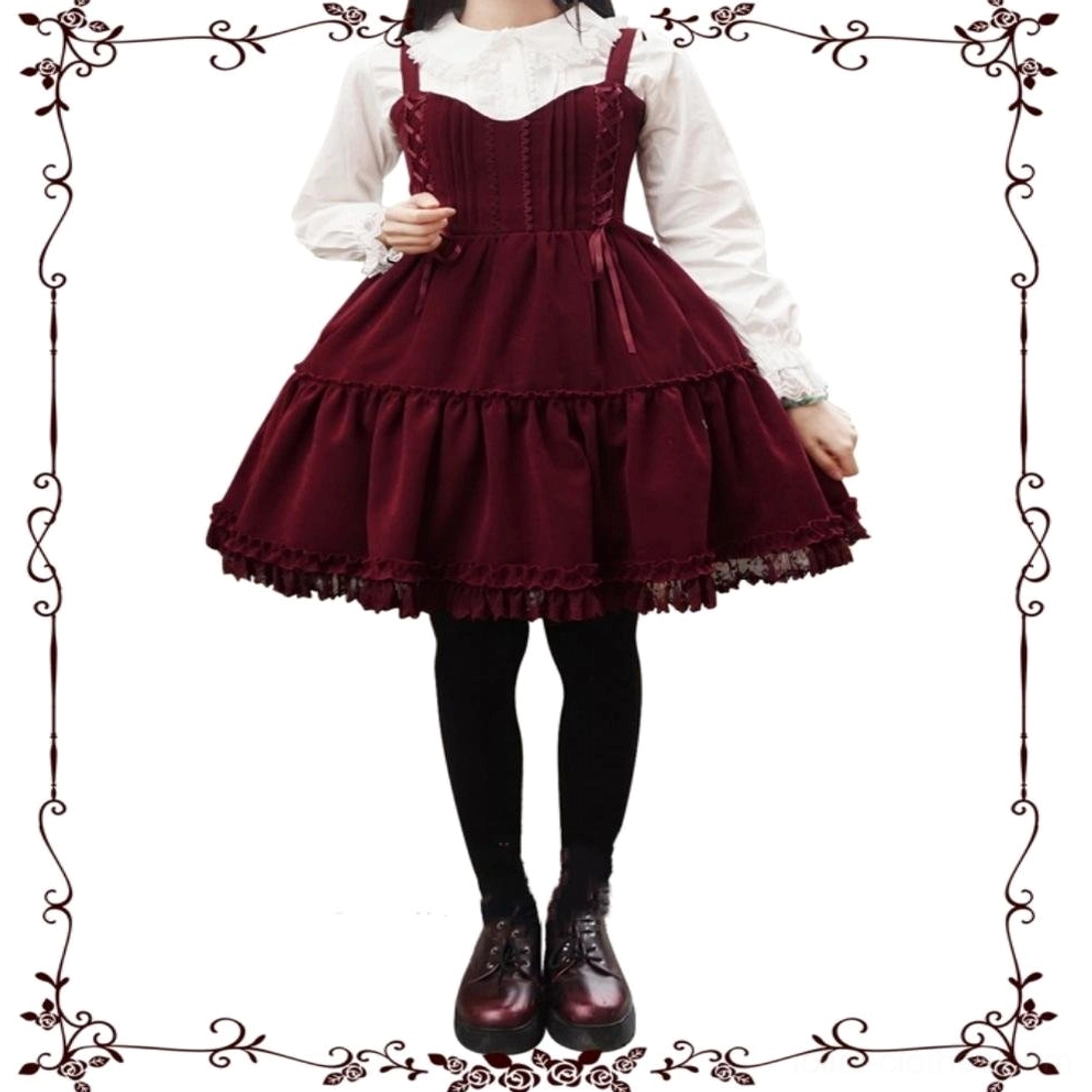 Burgundy lolita jsk with white inner blouse on female model half-side view black tights brown leather loafers silhouette details