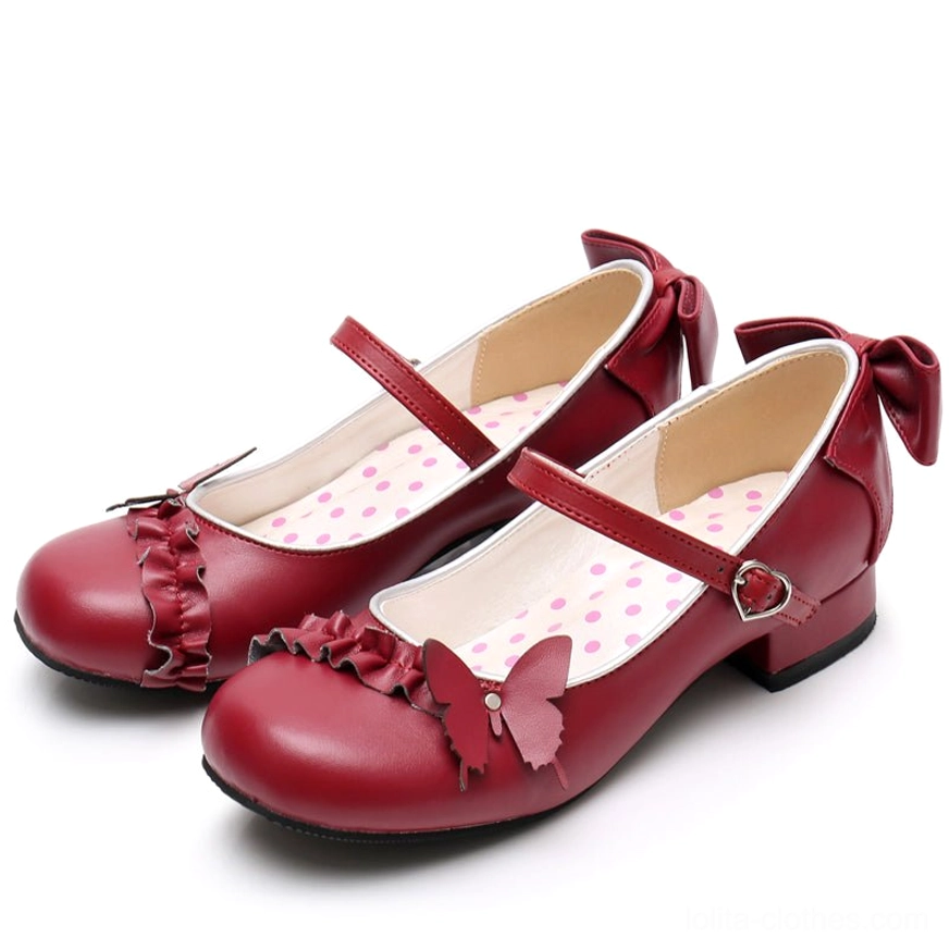 Burgundy sweet Lolita Mary Jane shoes flat lay product shot polka dot insole visible heart buckle butterfly decoration