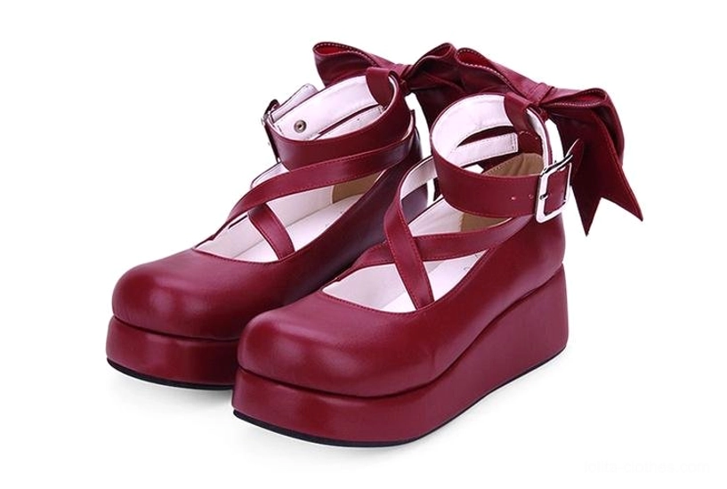 Wine red platform Lolita shoes three-quarter side view adjustable ankle buckle large fabric back bow round closed toe medium heel