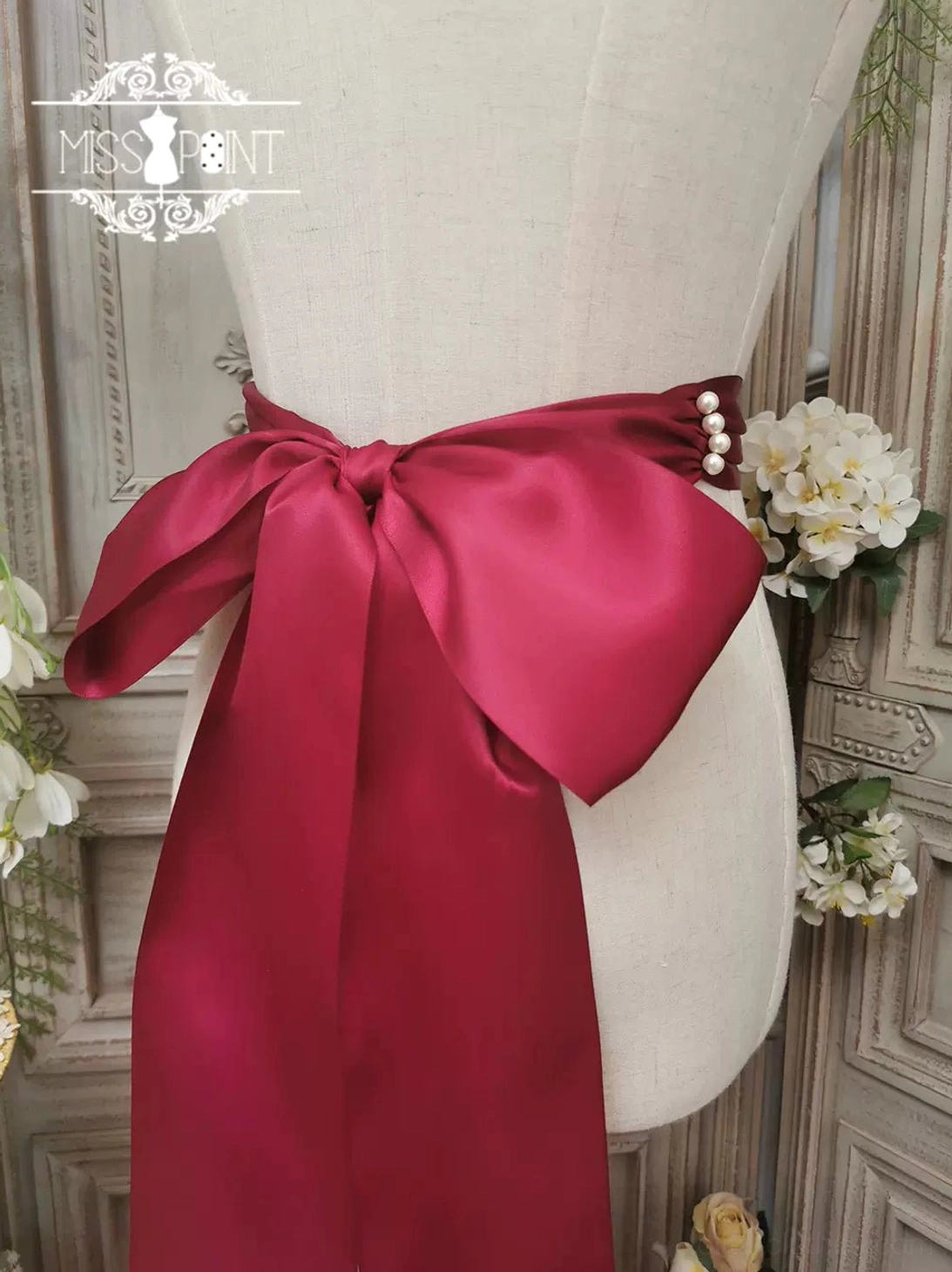 Burgundy lolita ribbon beaded belt variant displaying handcrafted waistband with pearl decorations and classic floral embroidery