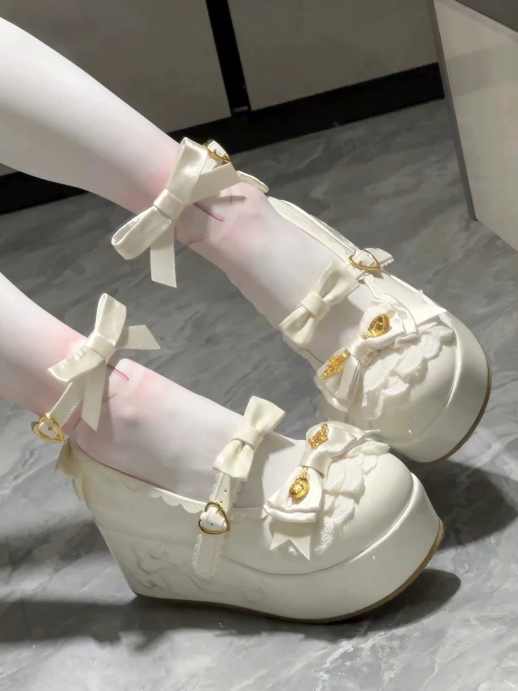 Burgundy mousse roll platform sweet lolita shoes close-up showing wine red patent leather finish embroidered bow and decorative gold hardware