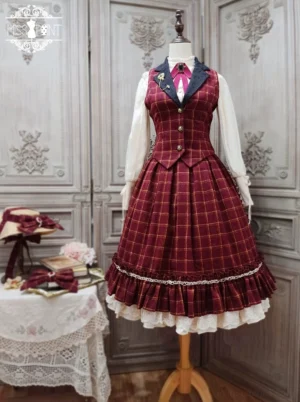 Burgundy plaid lolita fishbone grid JSK with ruffled lace hem and V-neckline on vintage dress form
