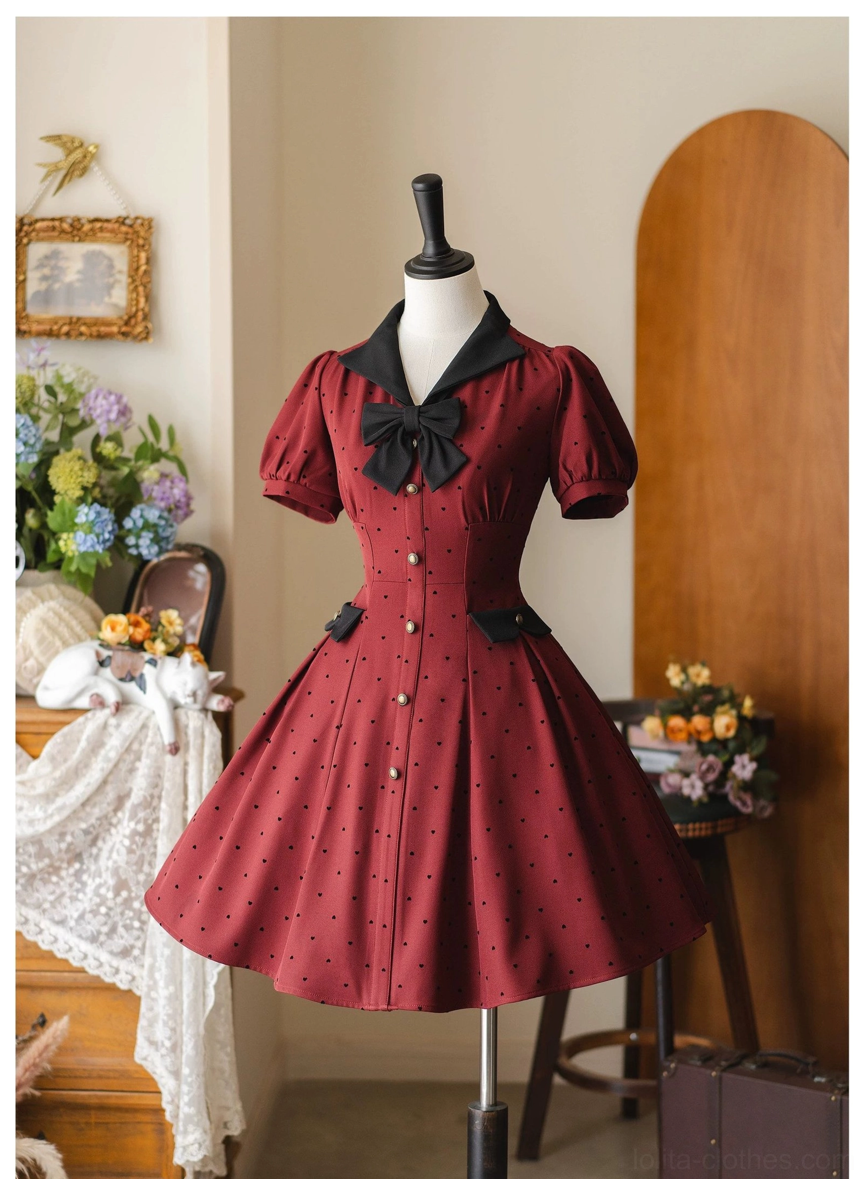 Burgundy red polka-dot classic lolita OP dress front full view mannequin with decorative buttons puff sleeves vintage indoor shooting background