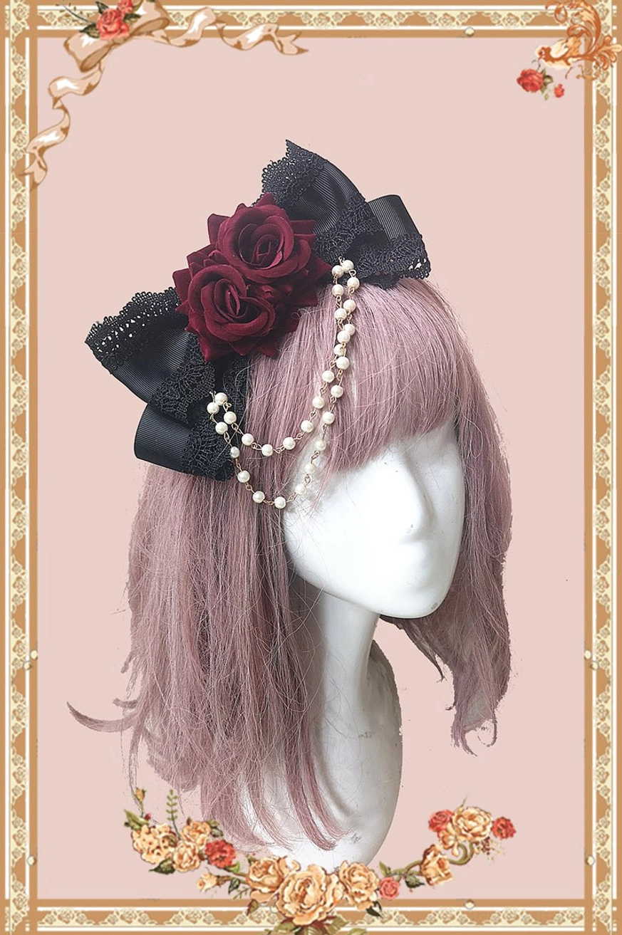 burgundy wine red artificial rose flower lace bow gothic lolita headdress clip side view detail showing pearl dangling chain vintage aesthetic