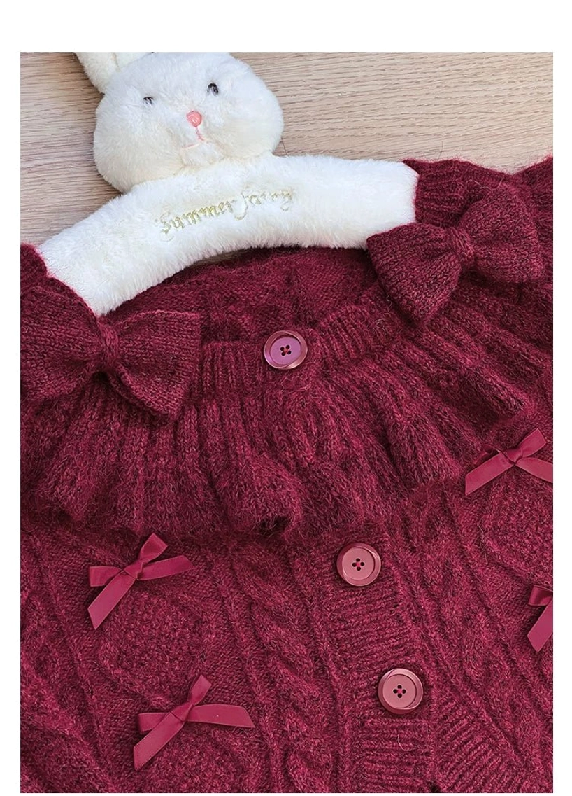 Burgundy Ruffle Cardigan Detail Shot Large Fabric Bows Ruffled Collar Pink Round Buttons Cable Knit Texture
