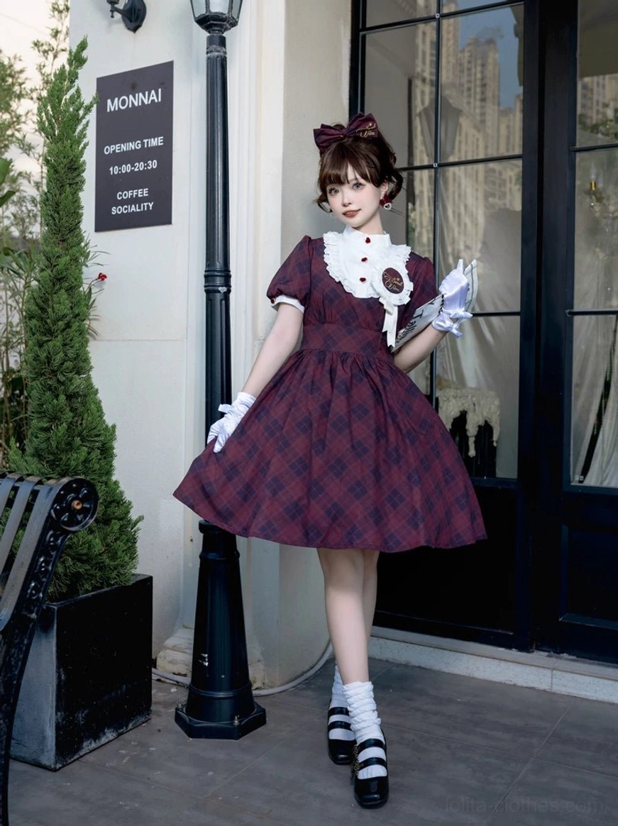 Burgundy wine plaid Showa retro lolita OP dress with ruffled Peter Pan collar, brooch detail, and puff sleeves worn with matching burgundy bow and white gloves at outdoor coffee shop