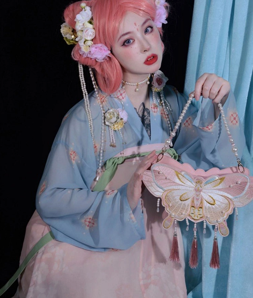 Qi Lolita butterfly handbag styling with coordinate showing how to wear and pair with Lolita fashion outfits