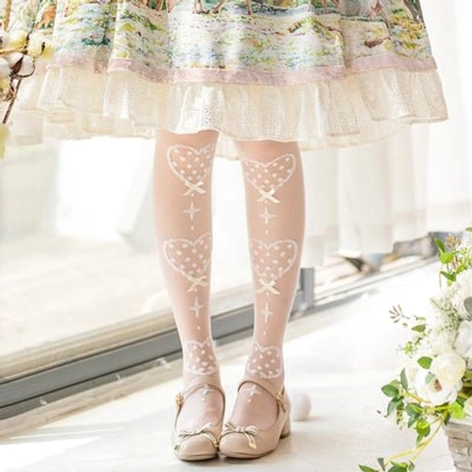 Calf-length Lolita knee socks in understated beige bow on white ground with delicate heart print and elastic cuff in sheer glass material