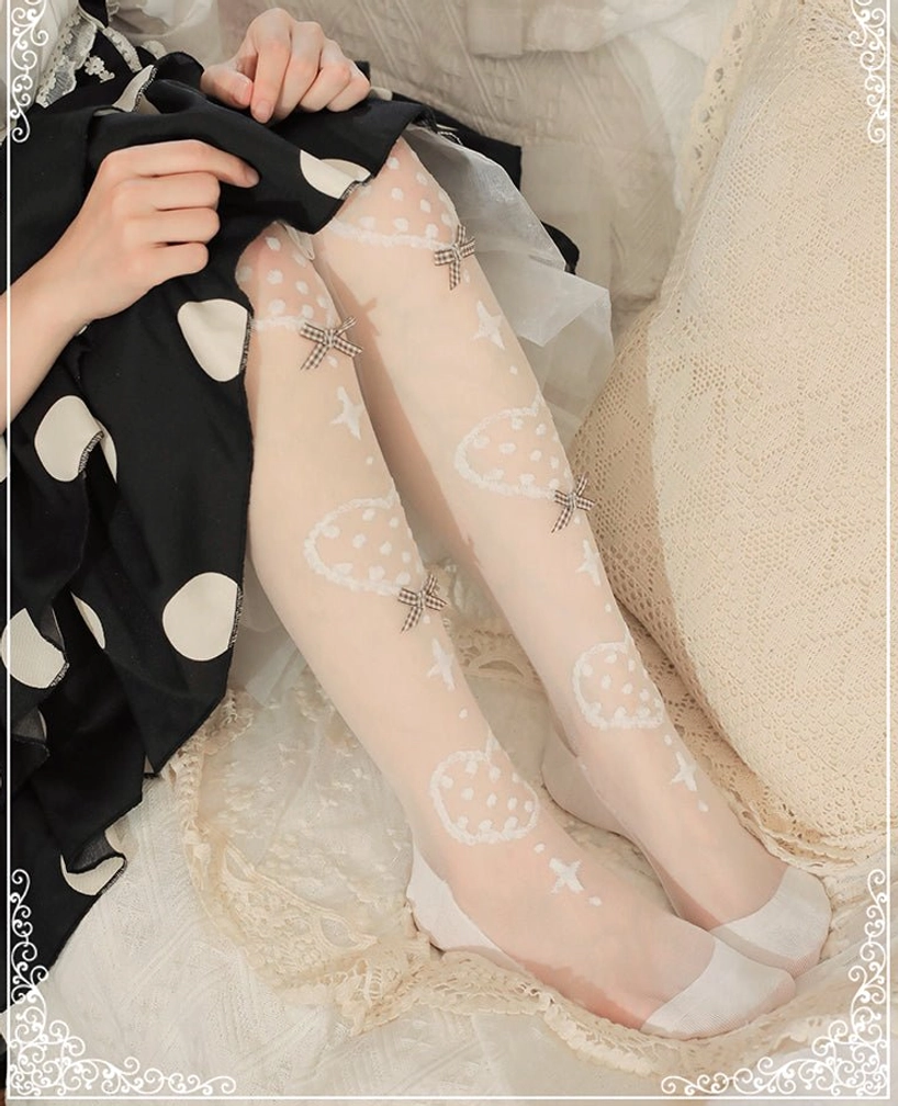 Calf-length Lolita socks in brown plaid bow on white ground design featuring sheer material and heart print decoration with elastic cuff