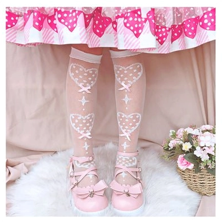 Calf-length Lolita socks in romantic pink bow on white background with charming polka dot heart decoration in breathable sheer fabric