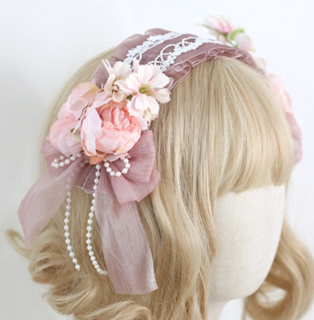 Cameo brown lolita floral lace headband with retaining clip showing vintage-inspired design on mannequin