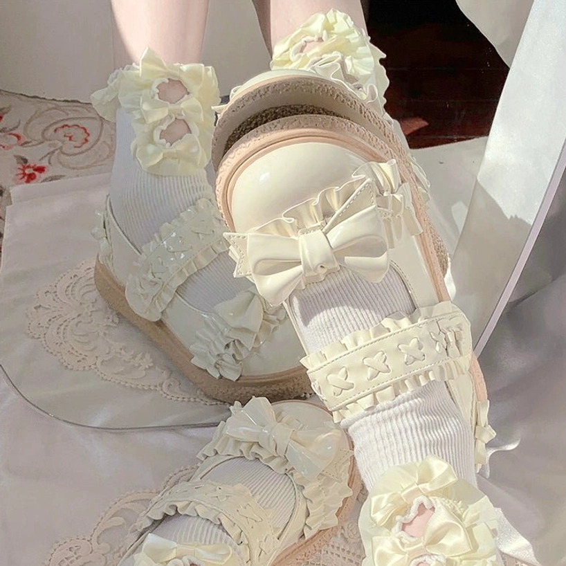 All colorway variations of candy-colored Lolita shoes arranged in palette display showcasing complete color spectrum from soft pastels to rich jewel tones