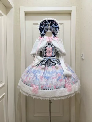 Navy blue pink cat print sweet lolita jumper skirt with white blouse coordinating capelet bonnet faux fur pom-pom decorations front dress form display