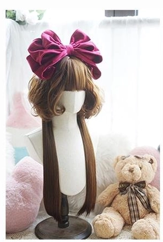 Caramel brown tone jellyfish curly lolita wig with long straight braids and large burgundy velvet crown bow, full front view