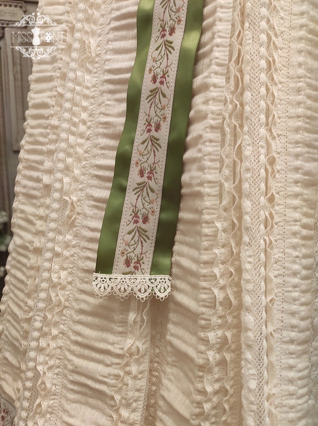Champagne colored handmade lolita ribbon belt with pearl beading and delicate floral weaving perfect for versatile lolita styling