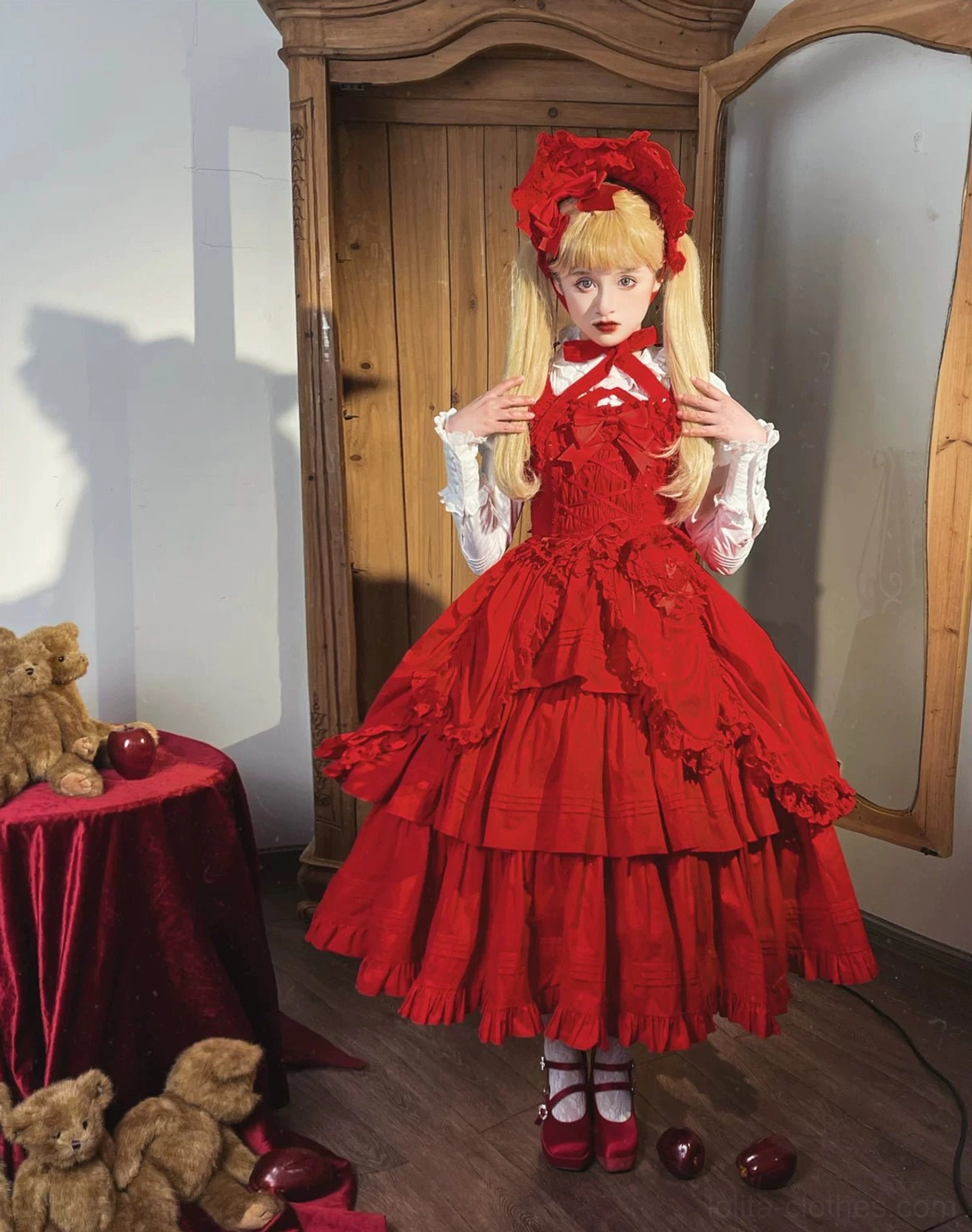 Back full-body mannequin shot of champagne Lolita JSK featuring large detachable back bow, back strap design, and elegant ruffled hem