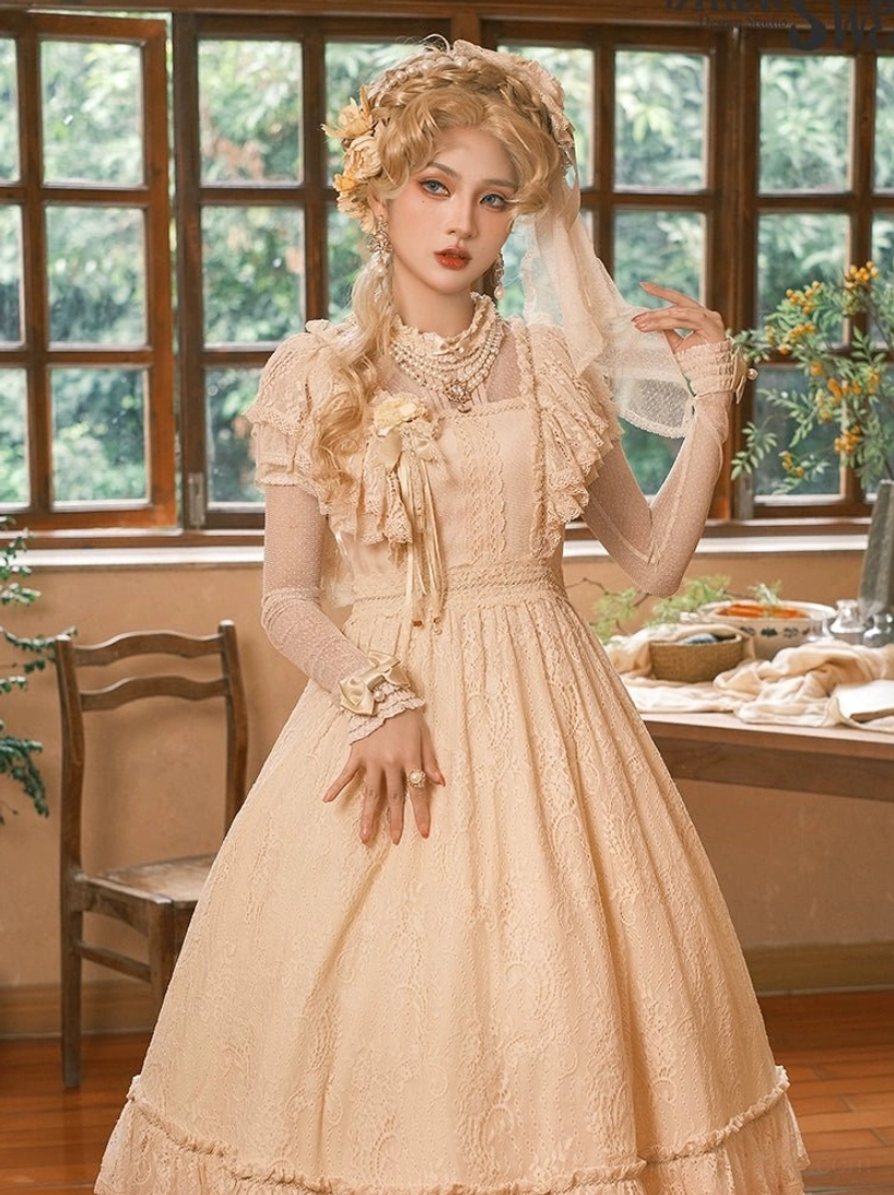 Champagne vintage Lolita OP dress full-length front standing view in vintage wooden dining room with window backdrop, embossed lace fabric, ruffled skirt hem, fitted bodice, floral hair ornaments and layered pearl necklaces