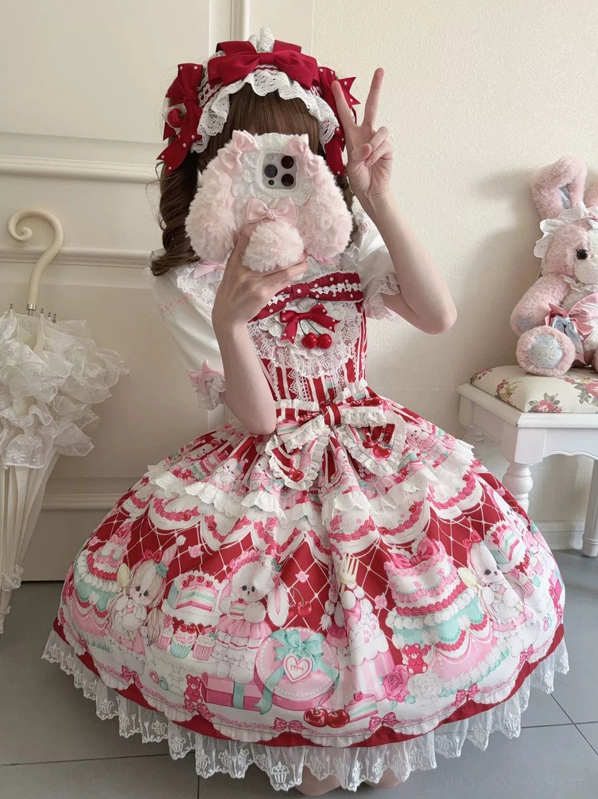 Cherry Bake Song Kawaii Lolita Jumper Skirt burgundy version, close-up full-body front view of model wearing matching burgundy headpiece in vintage indoor setting, fluffy puffy silhouette with detailed prints and lace hem