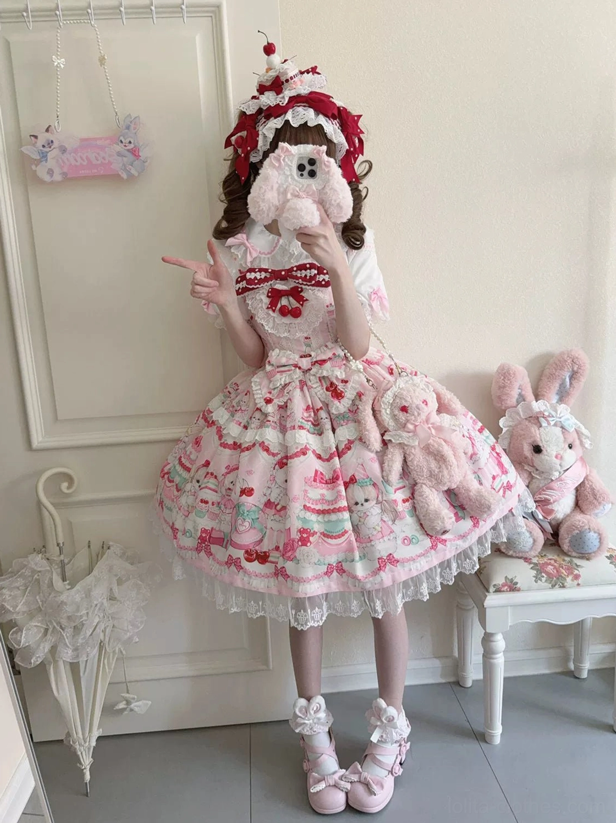 Cherry Bake Song Lolita JSK showing skirt hem detail with cupcake-shaped lace trim embellishment, animal print, and two-tiered construction layering