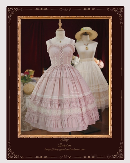Cherry blossom pink lolita JSK jumper skirt dress front full view mannequin display showing sweetheart neckline corset bodice ruffled layered skirt in vintage dark red gilt frame with floral background decorations