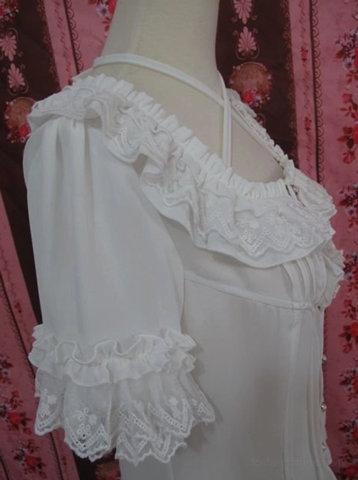 Side view of white chiffon lolita blouse showing layered lace sleeve cuffs and vertical bodice pleats with flowing fabric