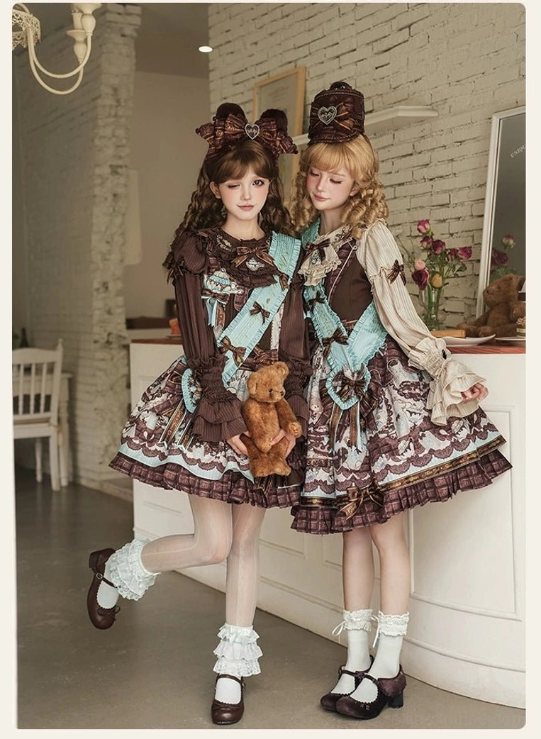 Twin chocolate-themed lolita outfits worn by two models in vintage brick cafe kitchen interior side full body view
