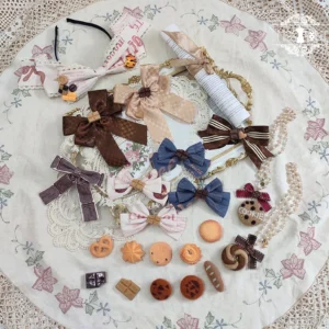 chocolate daily lolita bow brooch collection overhead flat lay assorted colorways checkered striped ribbon wooden accents mini cookies