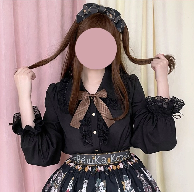 Chocolate Heart Lolita long-sleeve blouse lifestyle photo in natural outdoor light showing lace and ruffle details