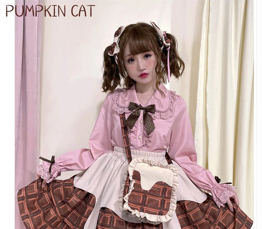 Chocolate Heart Sweet Lolita blouse ruffled cuff detail with ribbon tie fastenings and decorative bow accent