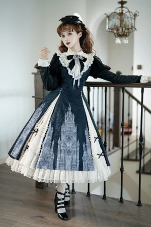 Church Bell gothic lolita OP dress full three-quarter view featuring contrasting white ruffled collar, cathedral print skirt, and black bow trims worn on vintage wooden staircase with chandelier
