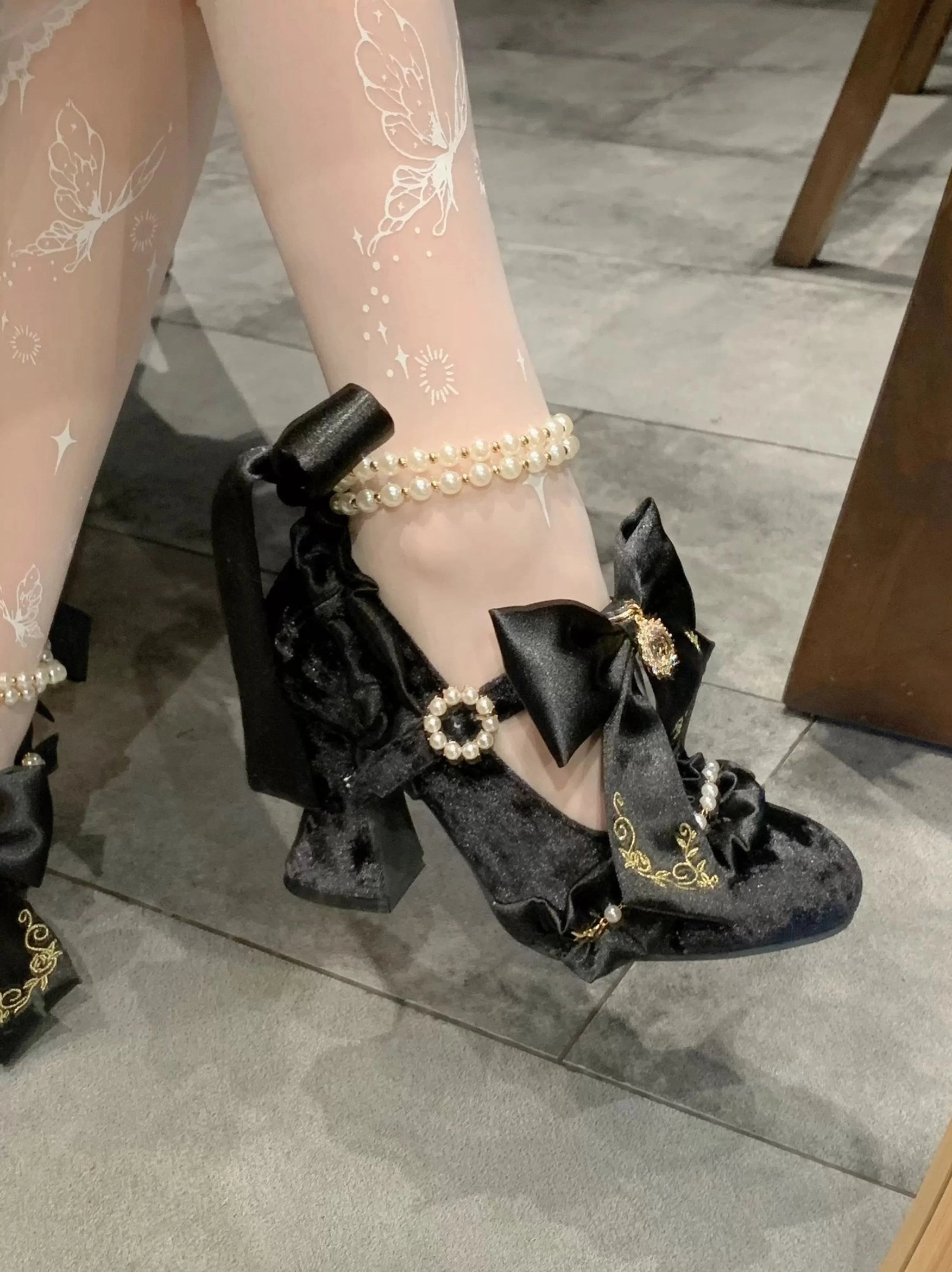Classic Lolita block heel shoes collection featuring multiple colors with detachable pearl chains and ribbon embellishments for versatile styling options