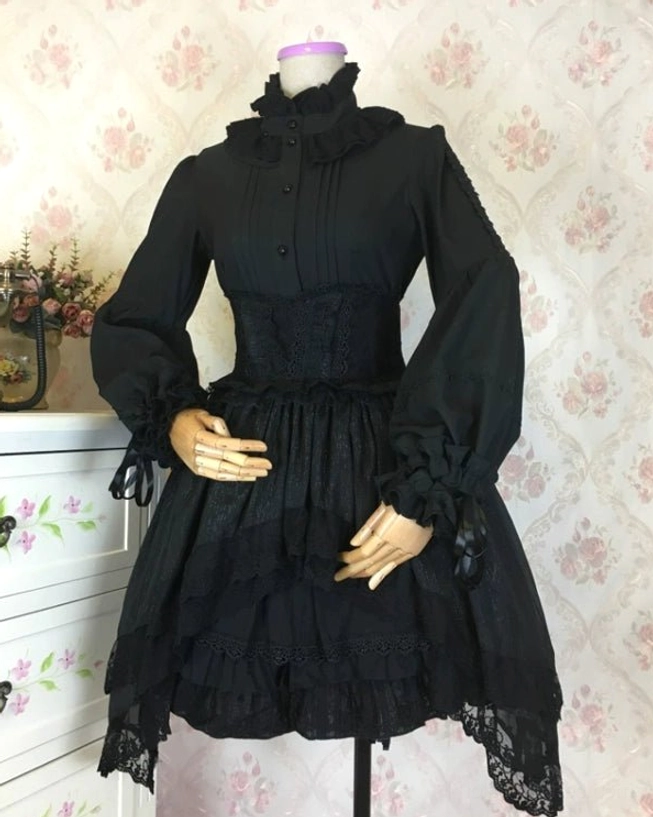 Complete back view of classic Lolita blouse showing rear silhouette, ruffled neckline, fitted waist construction, and adjustable sleeve bell shape from posterior perspective