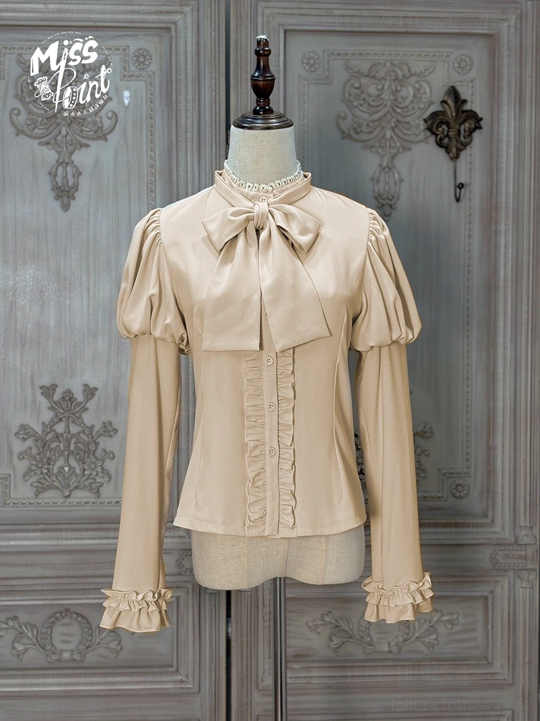 Classic Lolita blouse milk tea apricot beige color front view lace-trimmed stand collar detachable bow tie ruffled cuffs vintage romantic style
