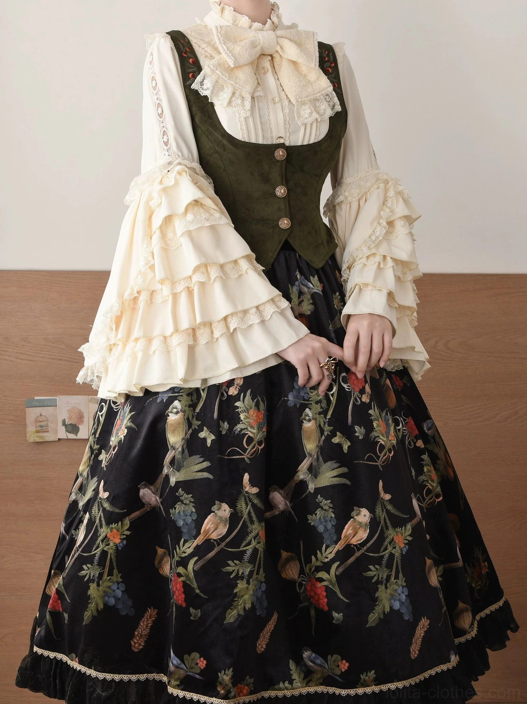 Classic Lolita blouse size range display, multiple sizes S M L XL 2XL shown together, demonstrating fit progression and sizing options for hime sleeve style