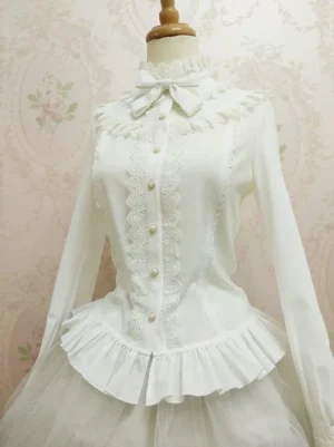 White classic stand collar Lolita blouse full front view on display mannequin featuring ruffled peplum waist lace trims and pearl buttons vintage styling