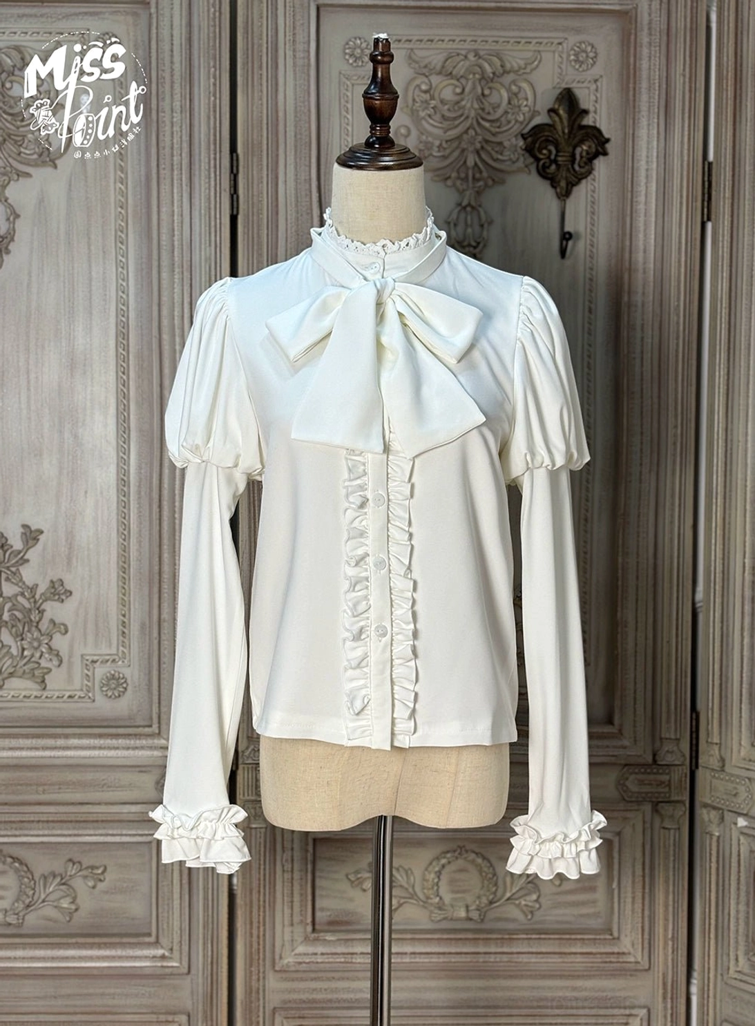 Classic Lolita blouse pure white color front view lace-trimmed stand collar detachable bow tie ruffled cuffs front ruffled placket