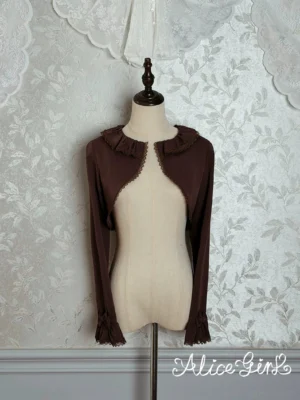 Deep brown classic lolita long-sleeve bolero front view on dress form with ruffled lace collar vintage styling